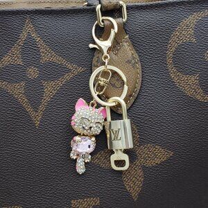 Authentic Louis Vuitton Lock & Key with Unbranded Cat Charm, Keychain